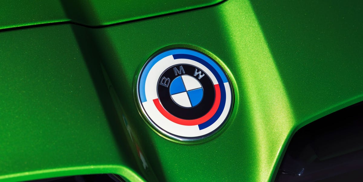 why some BMW models have a round white red and blue logo
